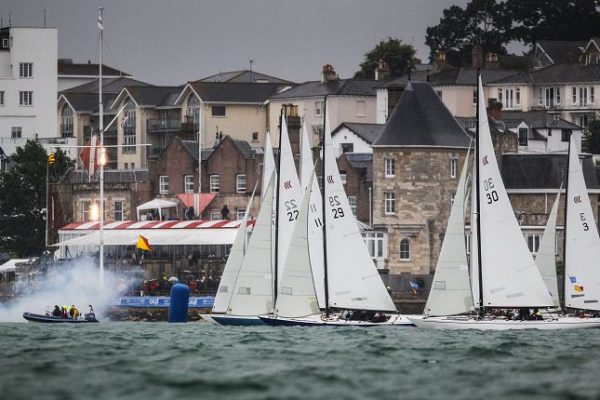 Yachts with white sails taking part in Cowes Week