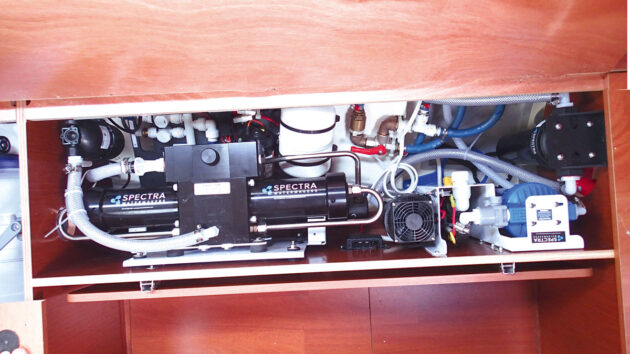 Low voltage Spectra Catalina watermaker with output of approximately 50lt per hour installed under a bunk