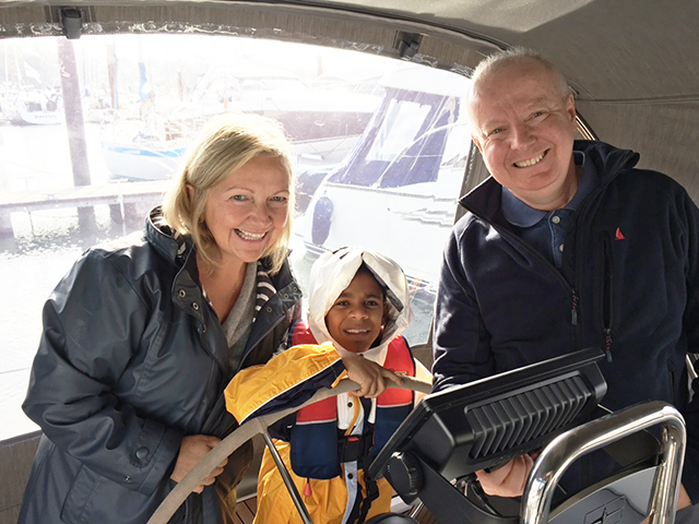 A couple on board a Bavaria 34