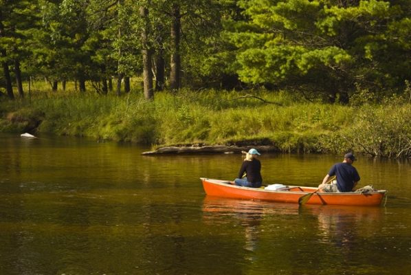 two people on a boat
