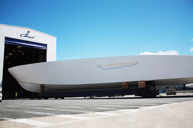 The hull of a superyacht coming out of the mould