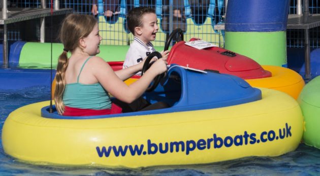 children on a bumper boat